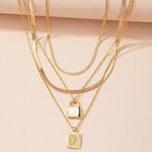 Load image into Gallery viewer, Gold Initial Letter and Lock Multi Layer Necklace in Gold Setting
