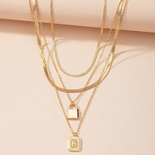 Load image into Gallery viewer, Gold Initial Letter and Lock Multi Layer Necklace in Gold Setting
