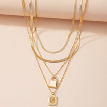 Load image into Gallery viewer, Gold Initial Letter and Lock Multi Layer Necklace in Gold Setting
