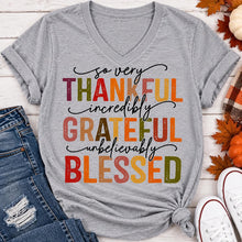Load image into Gallery viewer, Thankful Grateful Blessed fall graphic v-neck tee with colorful autumn lettering
