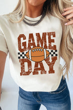 Load image into Gallery viewer, Person wearing a white t-shirt with 'Game Day' and football graphic.
