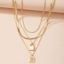 Load image into Gallery viewer, Gold Initial Letter and Lock Multi Layer Necklace in Gold Setting
