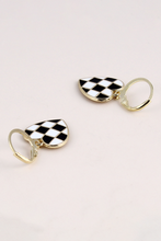 Load image into Gallery viewer, Pair of checkered heart-shaped earrings on a light pink background
