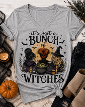 Load image into Gallery viewer, Gray It’s Just a Bunch of Witches Halloween graphic tee featuring three witches, cauldron, bats and spooky details.
