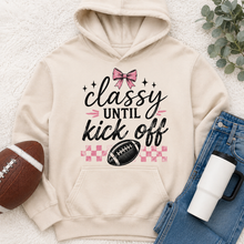 Load image into Gallery viewer, Classy Until Kick Off graphic hoodie with pink bow, football and pink checkerboard game day design
