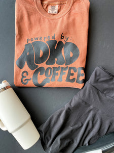 Powered By ADHD & Coffee | Women's Rusted Comfort Colors Graphic Tee