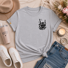 Load image into Gallery viewer, Gray crewneck graphic tee featuring a small black skeleton hand and “Wife Life” front chest graphic.
